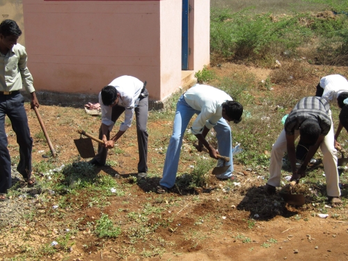 NSS boys doing the cleanliness work at Poovanthi camp