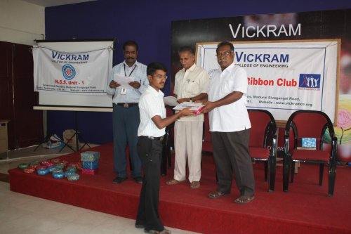 Winner of the drawining competition receiving prize 