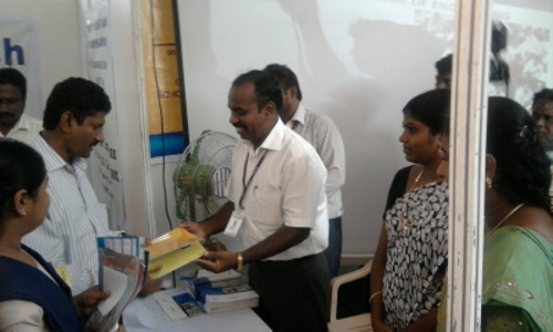 District Collector interacting at the stall