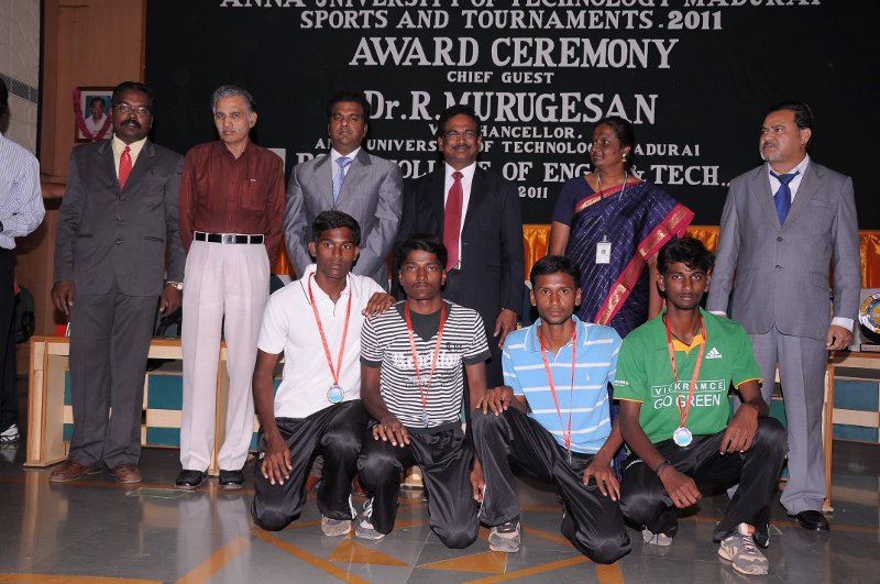 Athletic team received the overall Championship award. Sitting L to R - Mukesh Kumar, Muthu Pandi, Muthu Bharathi, Subash Chandra Bose.