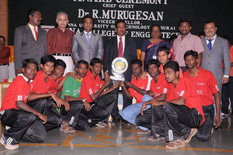 College Football Team Receiving the Winners Trophy at the sports award function. Sitting L to R - Vijayakumar, Saravanan, Prakash, Gunasekaran, Jeyamurugan, Arunkumar, Vignesh, Jithesh, Parthiban, Kathik.