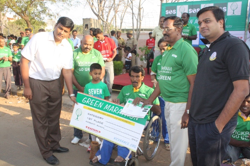 The Chairman and the Joint Secretary distributing the prizes for the Wheel Chair Category.