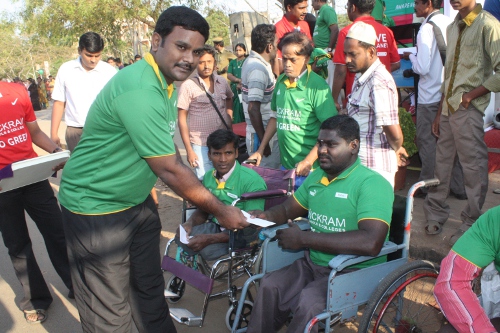 Secretary distributing the prizes for the Wheel Chair Category.