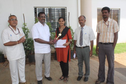 R.Divyasri of IInd Year Civil Engineering receive the shield from our college Chairman Mr.M.K.S.Shreenivasan